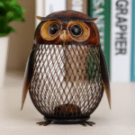 Tirelire hibou sculptée en métal