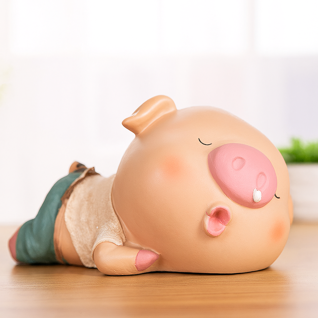 Tirelire cochon endormi en résine - A - 17x11x8cm