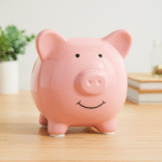 Tirelire cochon rose souriant en céramique