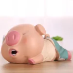 Tirelire cochon endormi en résine
