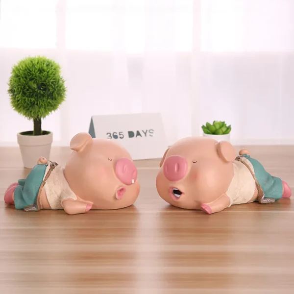 Tirelire cochon endormi en résine – Image 3